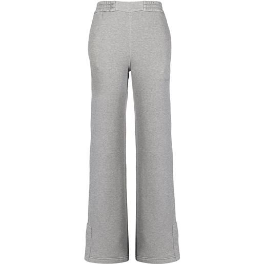 Off-White pantaloni sportivi svasati con strisce oblique - grigio