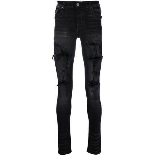 AMIRI jeans skinny con effetto vissuto - nero