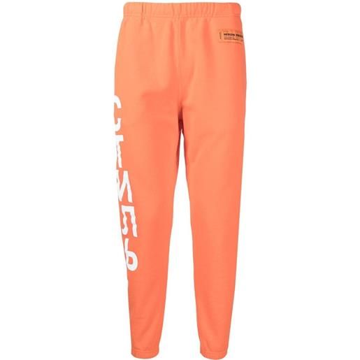 Heron Preston pantaloni sportivi con logo стиль - arancione