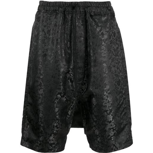 Junya Watanabe MAN shorts con stampa - nero