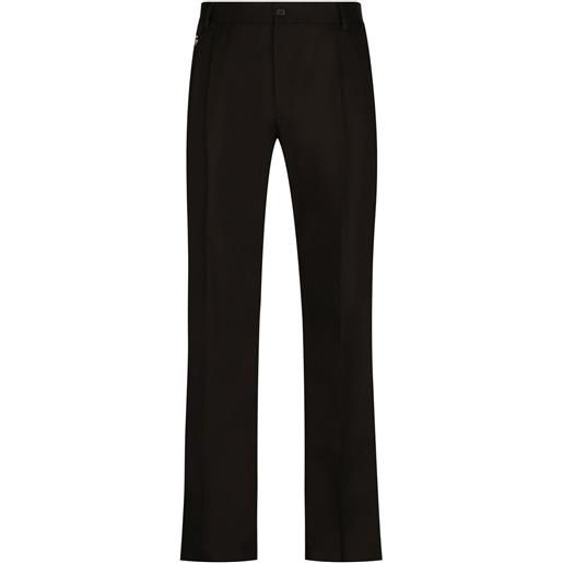 Dolce & Gabbana pantaloni con applicazione dg - nero