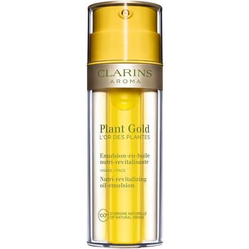 Clarins plant gold 35ml fluido viso nutriente, olio viso nutriente, fluido viso illuminante, olio viso illuminante