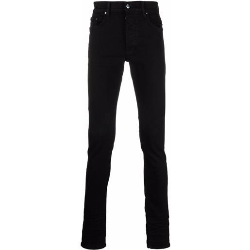 AMIRI jeans skinny con applicazione - nero