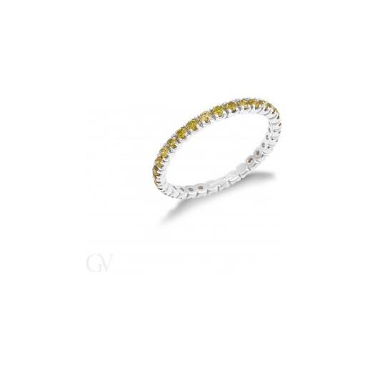 Gioielli di Valenza eternity a griffe in oro bianco 18k con diamanti gialli