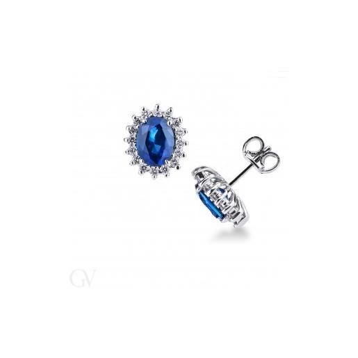 Gioielli di Valenza orecchini in oro bianco 18k con zaffiro blu e diamanti a contorno