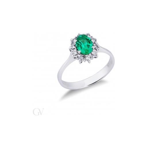 Gioielli di Valenza anello contorno in oro bianco 18k con smeraldo ovale e diamanti