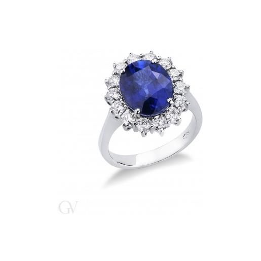 Gioielli di Valenza anello contorno in oro bianco 18k con diamanti e zaffiro blu centrale