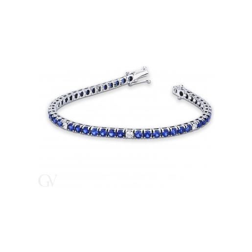 Gioielli di Valenza bracciale tennis in oro bianco 18k con zaffiri blu e diamanti, larghezza maglia 3,30 mm circa. 