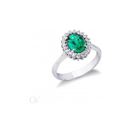 Gioielli di Valenza anello contorno in oro bianco 18k con smeraldo taglio ovale e diamanti