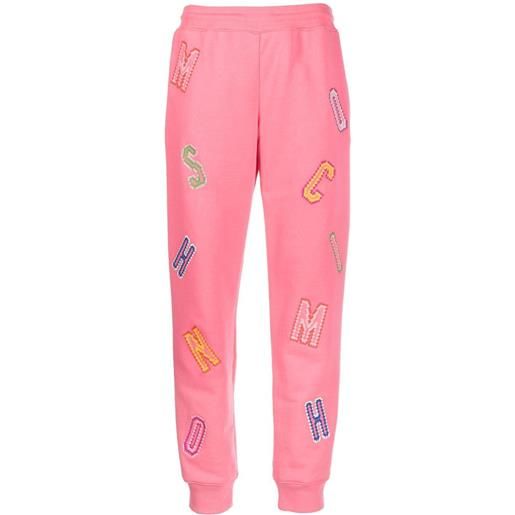 Moschino pantaloni sportivi con logo - rosa