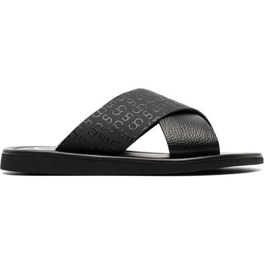 Casadei sandali slides con monogramma goffrato - nero