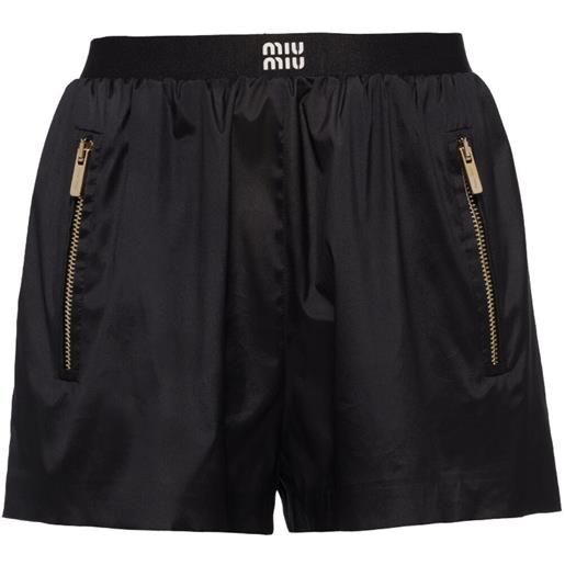 Miu Miu shorts running con logo - nero