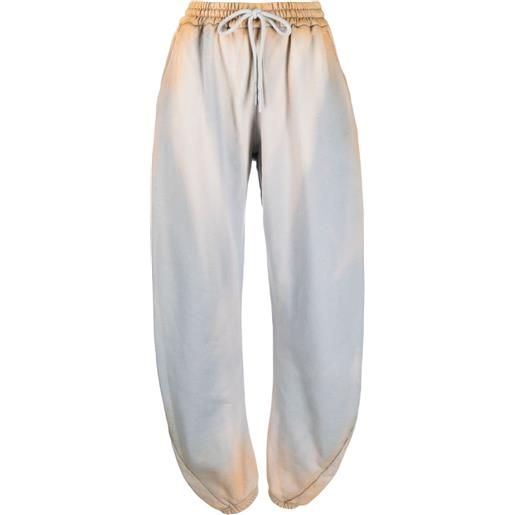 Off-White pantaloni sportivi con fantasia tie-dye laundry - toni neutri