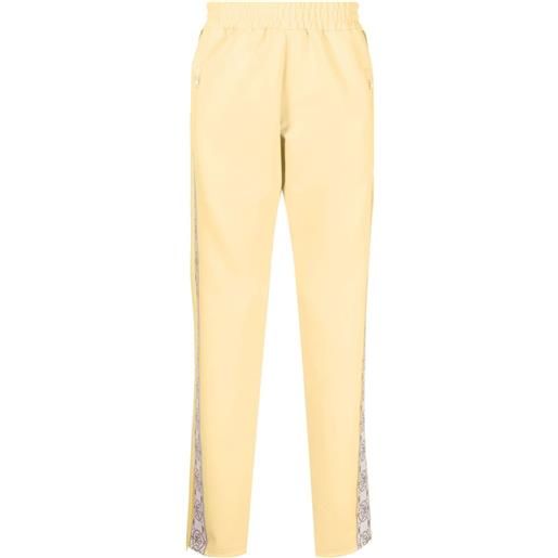 MOUTY pantaloni sportivi con stampa - giallo
