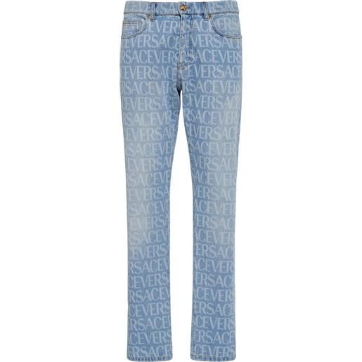 VERSACE jeans in denim di cotone monogram