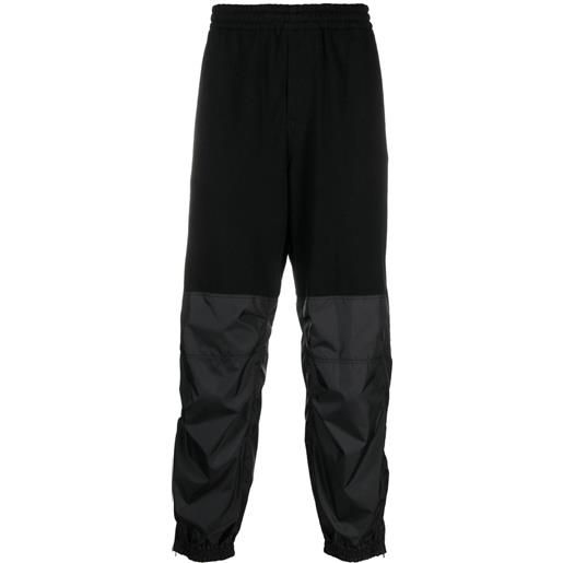 Undercover pantaloni sportivi con vita elasticizzata - nero