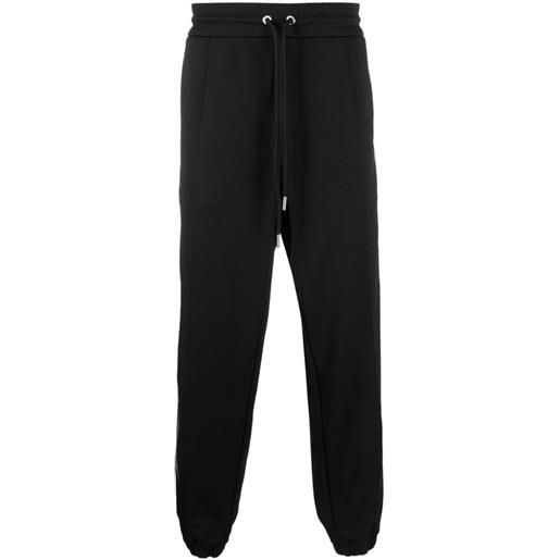Moncler pantaloni sportivi con righe laterali - nero