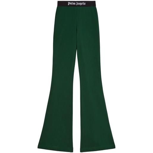 Palm Angels pantaloni svasati con banda logo - verde