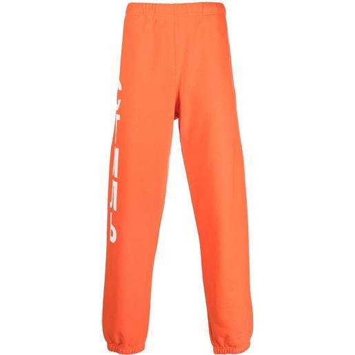 Heron Preston pantaloni sportivi con stampa - arancione