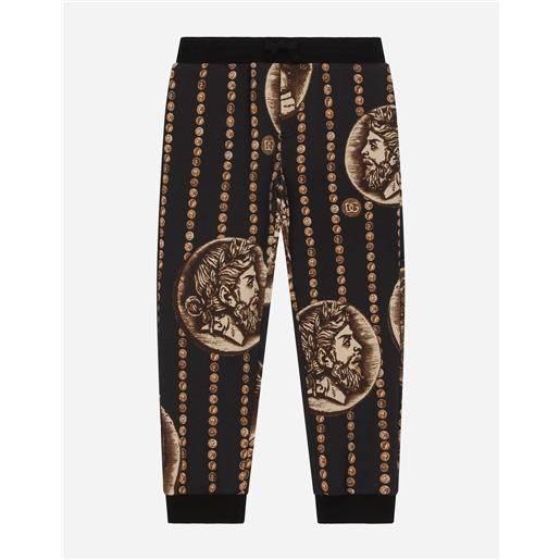 Dolce & Gabbana pantalone jogging in cotone con stampa monete allover