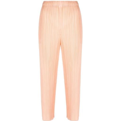 Issey Miyake pantaloni crop con effetto plissettato - rosa