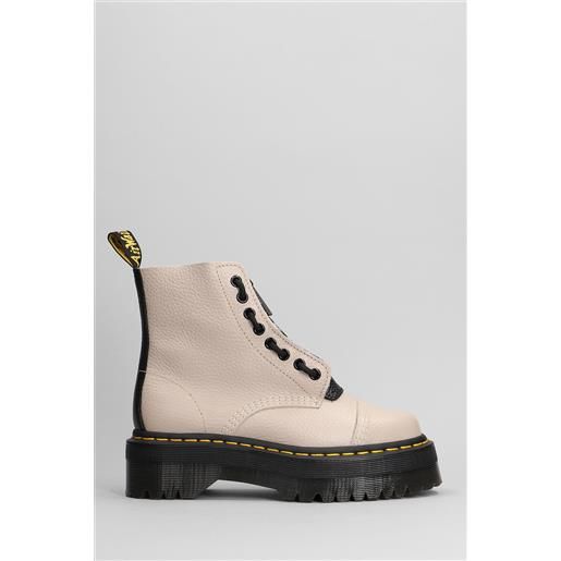 Dr. Martens anfibi sinclair in pelle taupe