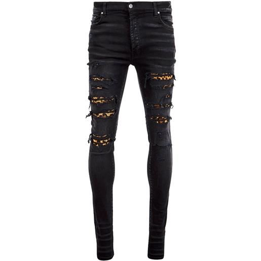 Amiri - jeans in denim leopardati