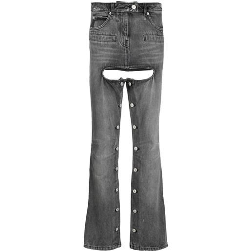 Courrèges jeans svasati con borchie - grigio