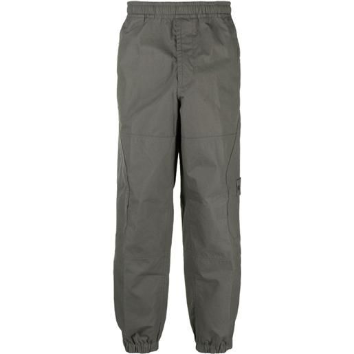 Stone Island pantaloni affusolati con motivo compass - grigio