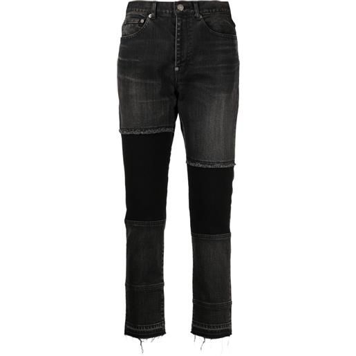 Undercover jeans con applicazione - nero