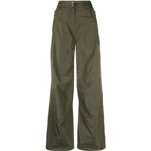 Moncler pantaloni svasati con applicazione - verde