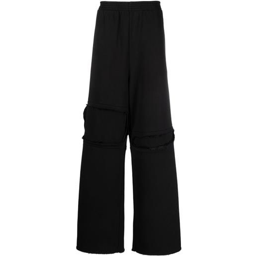 MM6 Maison Margiela pantaloni sportivi con effetto vissuto - nero