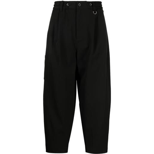SONGZIO logo-embroidered pleated drop-crotch trousers - nero