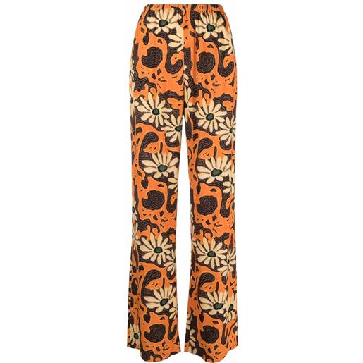 Nanushka pantaloni a fiori - arancione