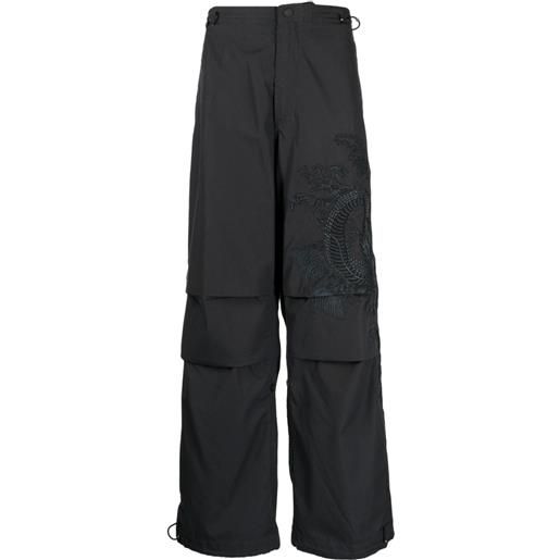 Maharishi pantaloni a gamba ampia con stampa grafica - nero