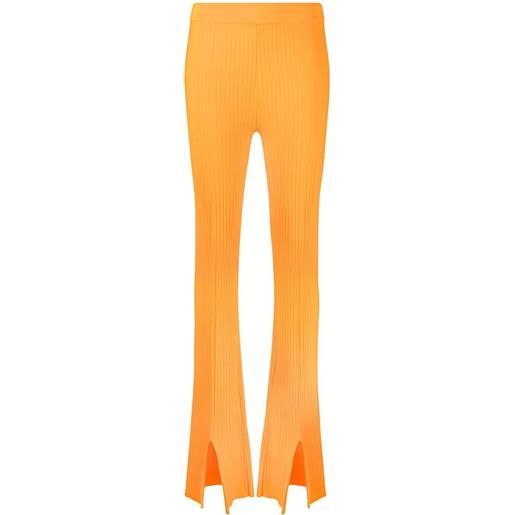 Nanushka pantaloni a coste - arancione