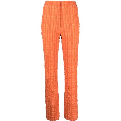 Nanushka pantaloni juna - arancione