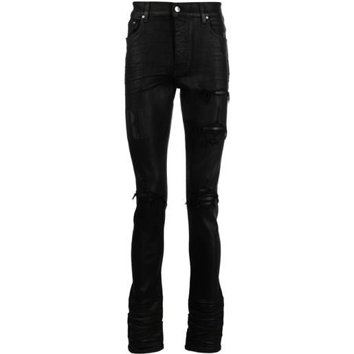 AMIRI jeans slim con effetto vissuto - nero