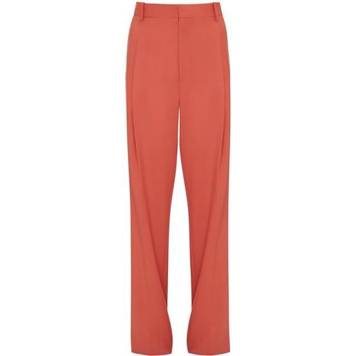 Victoria Beckham pantaloni a gamba ampia con pieghe - arancione