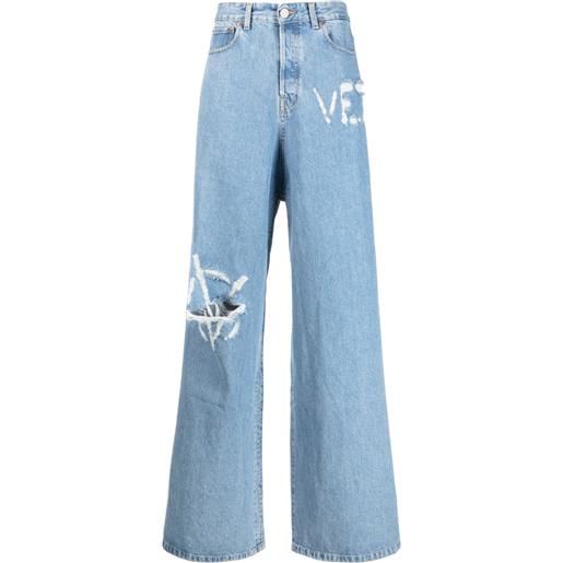 VETEMENTS jeans con logo effetto vissuto - blu