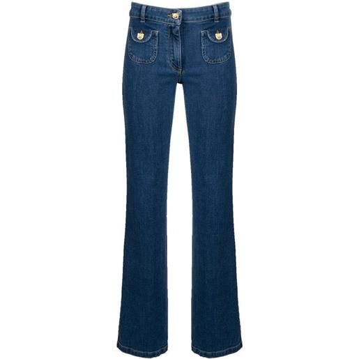 Moschino jeans anni '70 con bottone a orsetto