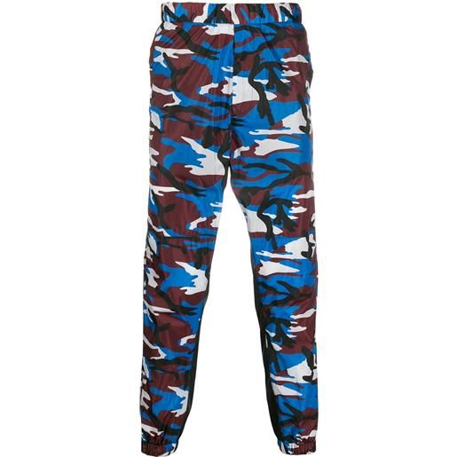 Prada pantaloni sportivi con stampa camouflage - rosso