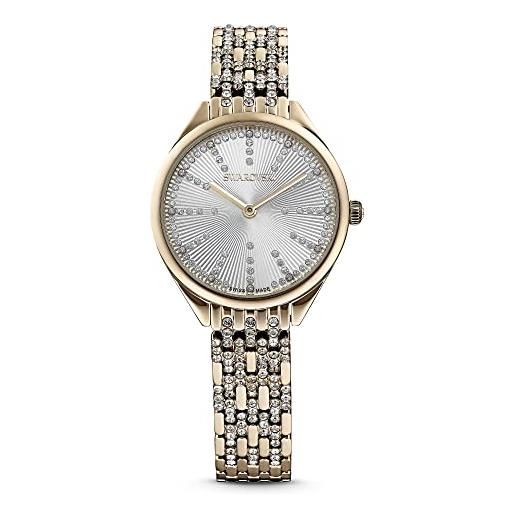 Swarovski attract orologio, con cristalliSwarovski e bracciale di metallo, finitura in tonalità oro champagne, meccanismo al quarzo, tono dorato