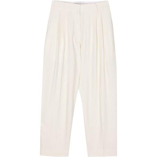 Studio Nicholson pantaloni a gamba ampia con pieghe - bianco
