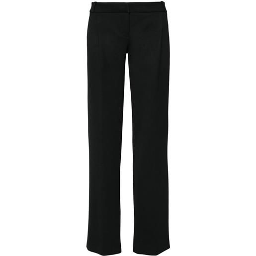Coperni pantaloni con placca logo - nero