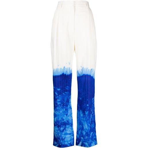 Stain Shade pantaloni con fantasia tie-dye - bianco