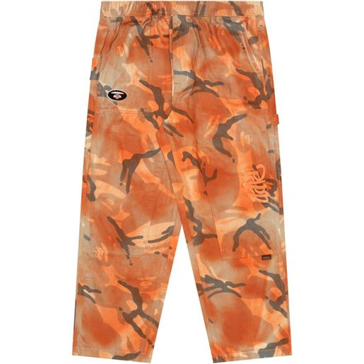 AAPE BY *A BATHING APE® pantaloni con stampa camouflage - arancione