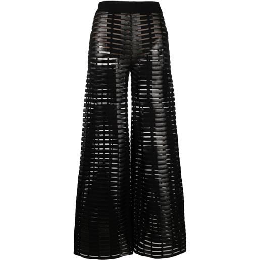 Genny pantaloni svasati con effetto metallizzato - nero