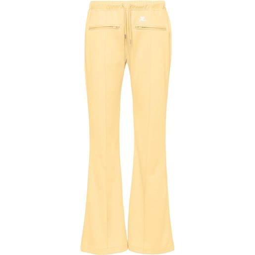Courrèges pantaloni ampi con applicazione logo - giallo