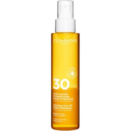 Clarins olio solare illuminante corpo spf 30 150 ml olio nutriente alta protezione, ideale per una pelle morbida e idratata